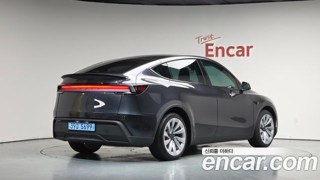 2025 Tesla Model Y, VIN LRWYGCEK0SC313154