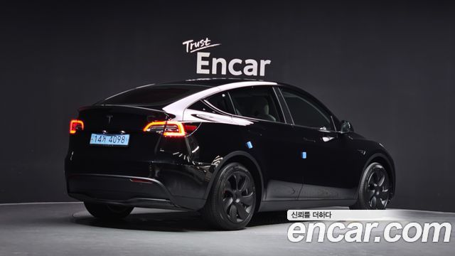 2023 Tesla Model Y, VIN LRWYGCFS5PC130273