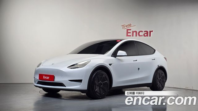 2023 Tesla Model Y, VIN LRWYGCFS6PC103177