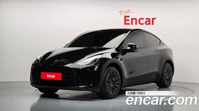 2023 Tesla Model Y, VIN LRWYGCFS4PC104229