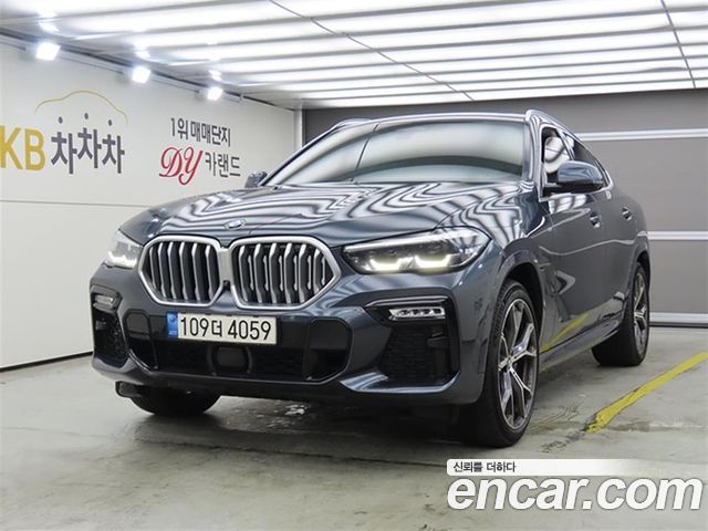 2021 BMW X6, VIN WBAGT8106M9F99832