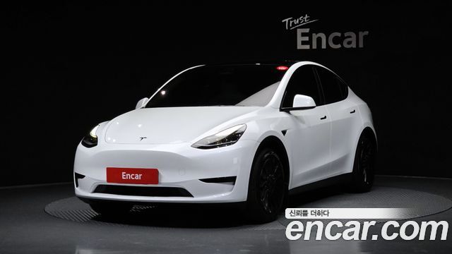 2023 Tesla Model Y, VIN LRWYGCFS0PC103711
