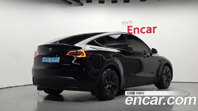 2024 Tesla Model Y, VIN LRWYGCEK1RC615630