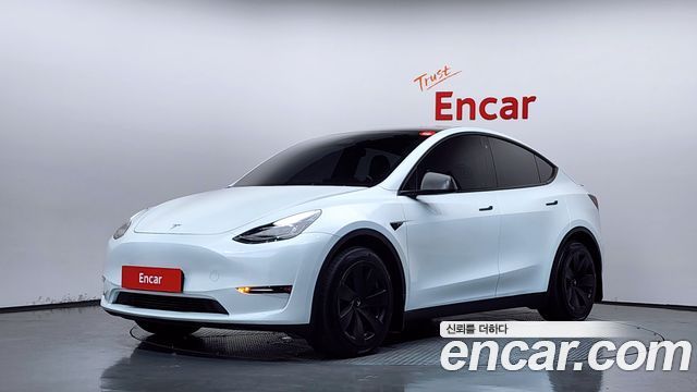2022 Tesla Model Y, VIN 7SAYGDEE2NF566568