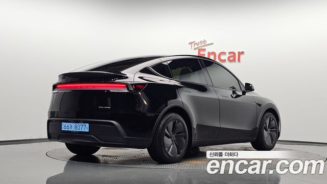 2025 Tesla Model Y, VIN LRWYGCEKXSC215877