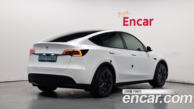 2023 Tesla Model Y, VIN LRWYGCFSXPC104154