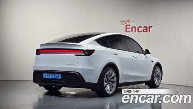 2026 Tesla Model Y, VIN LRWYGCEK5TC552510