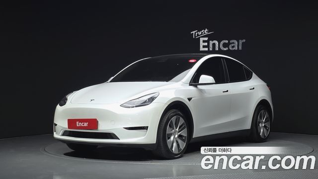 2021 Tesla Model Y, VIN 5YJYGDED5MF237396