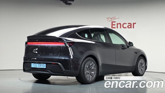 2026 Tesla Model Y, VIN LRWYGCEKXTC909177
