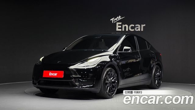 2024 Tesla Model Y, VIN LRWYGCFS5RC206948